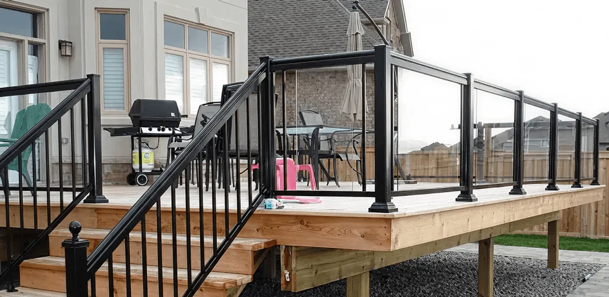 Handrail installation on a deck staircase for safety and code compliance in Jersey City, NJ