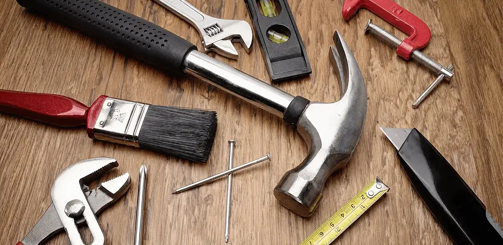 Handyman tools laid out for home repair and maintenance work in Jersey City, NJ